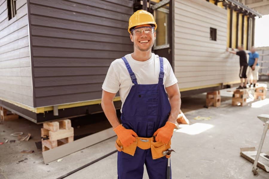 construction loans - man in hardhat on construction site