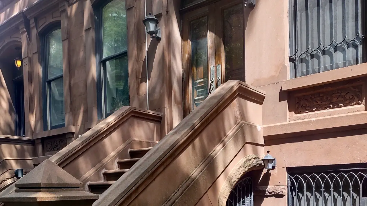 Image of a brownstone apartment building door in New York City
