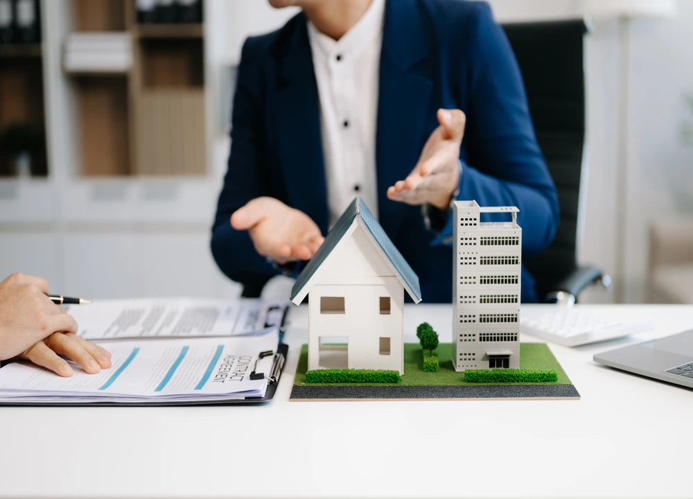 Real estate investor discussing financing options