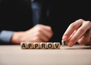 approval symbolizing successful fix and flip funding application.