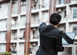 Real estate investor in NYC analyzing property