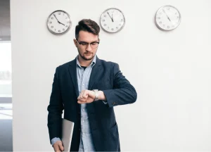 Investor looking at a clock symbolizing time-sensitive real estate deals