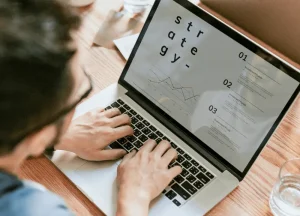 Contractor reviewing renovation plans and cost estimates with investor